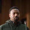 British triple murder suspect pleads guilty to firearm and immigration charges